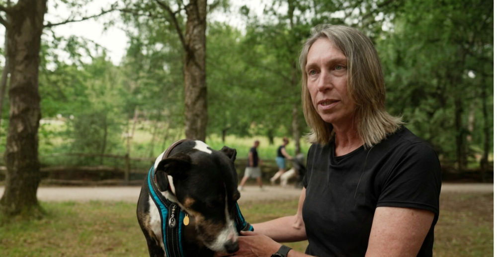 Woman and her dog during the TV Interview